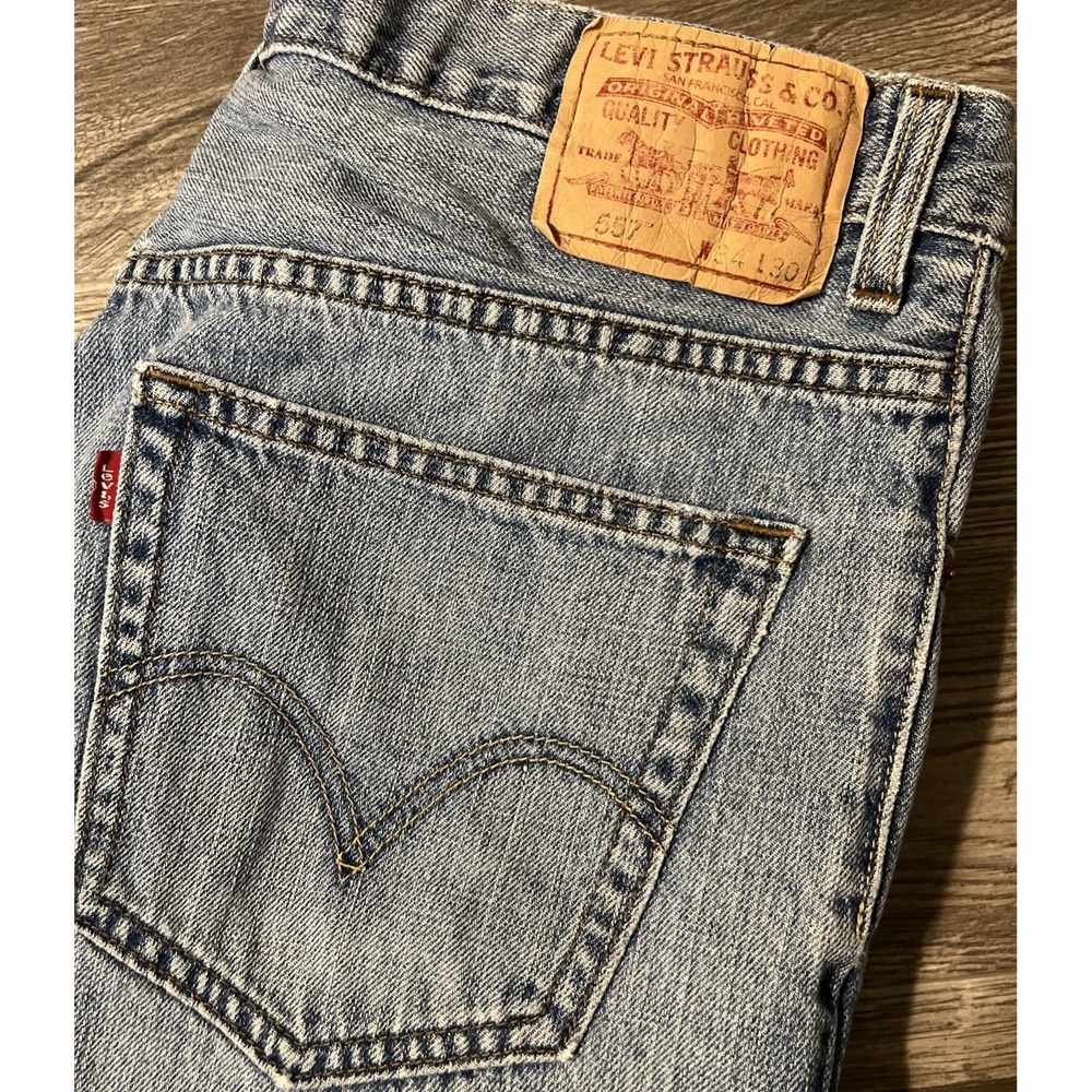 Levi's 557 Relaxed Fit Boot Cut Light Wash 2000s Cowboy Blue Jeans Size 34x30